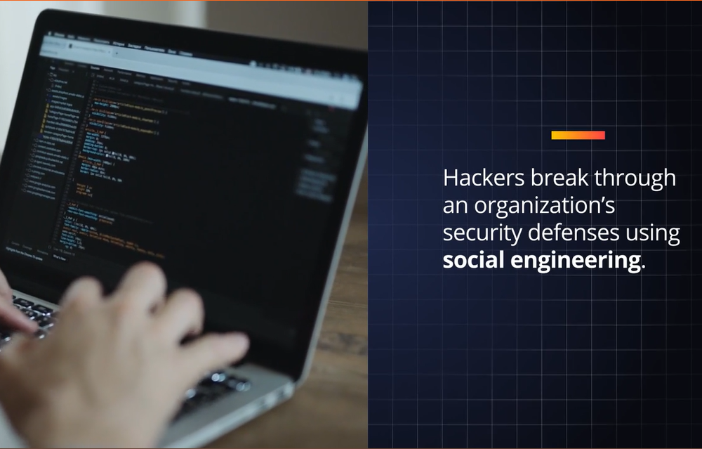 user typing with text "Hacker break through an organization's security defenses using social engineering"